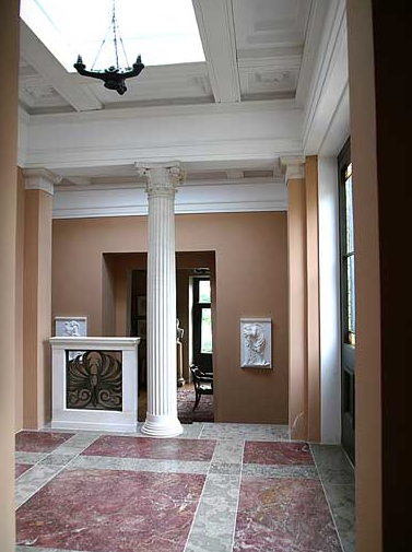 Corinthian column in the entrance hall at Coed Mawr 